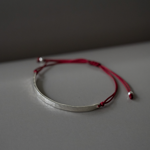 PULSERA CORDA ROJA PLATA